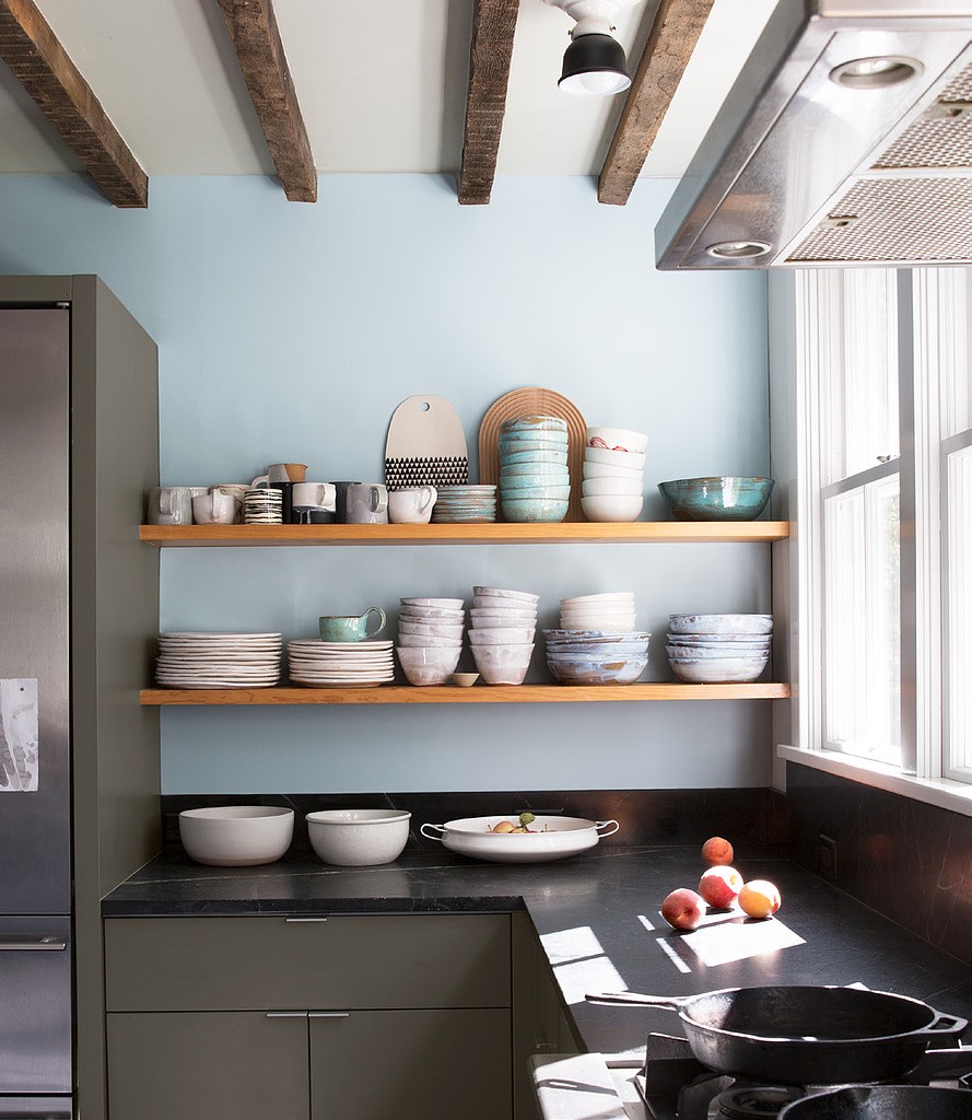 Wooden shelves with dishes on them